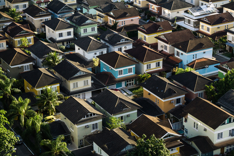 Can you share some tax planning suggestions for individuals investing in real estate?